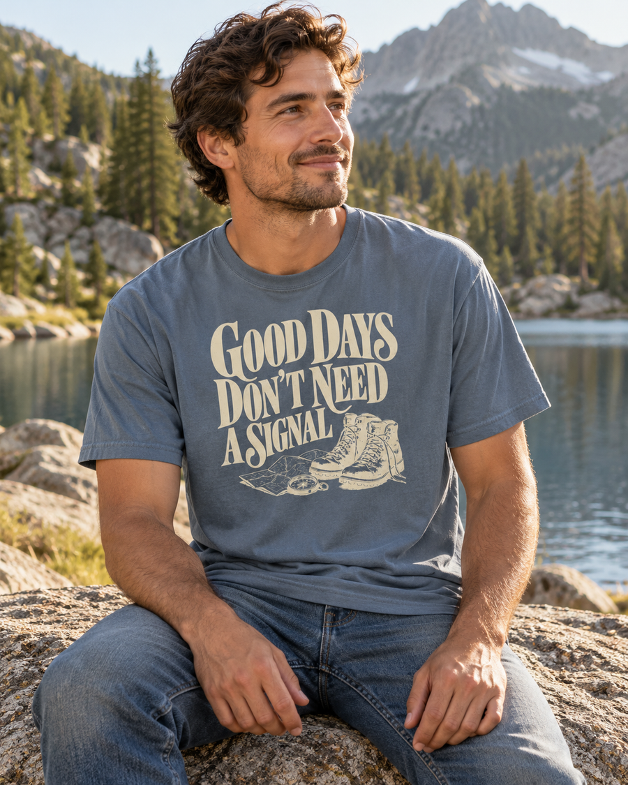 Good Days Don't Need a Signal Tee — Blue Jean — lifestyle portrait beside an alpine lake