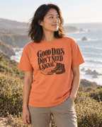 Good Days Don't Need a Signal Tee — Terracotta — lifestyle portrait on a coastal trail