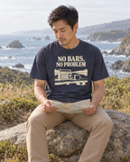 No Bars, No Problem Tee — Navy — lifestyle reading a map beside the coast